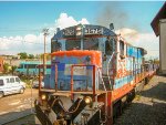 FXE C30-7 Locomotive in the yard with faded paint scheme